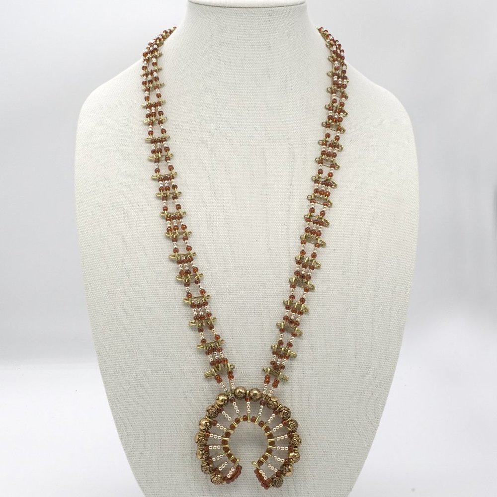Necklace made out of Safety Pins and Seed Beads.